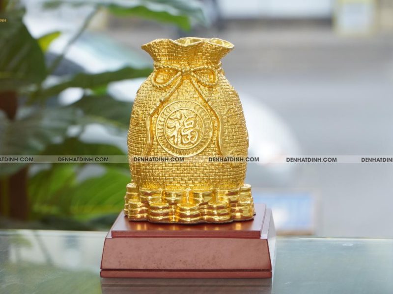 Túi tiền tiết kiệm bằng đồng dát vàng