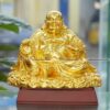 Tượng Phật Di Lặc cầm hũ tiền bằng đồng dát vàng
