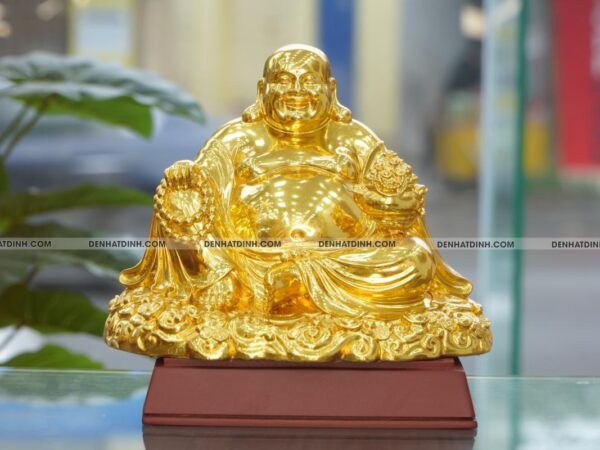 Tượng Phật Di Lặc cầm hũ tiền bằng đồng dát vàng